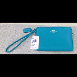 Coach corner zip wristlet in turquoise